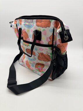 Feifeiyu brand backpack features a colorful cartoon capybara and strawberry prin